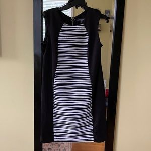 Sleeveless black and white dress. Knee length